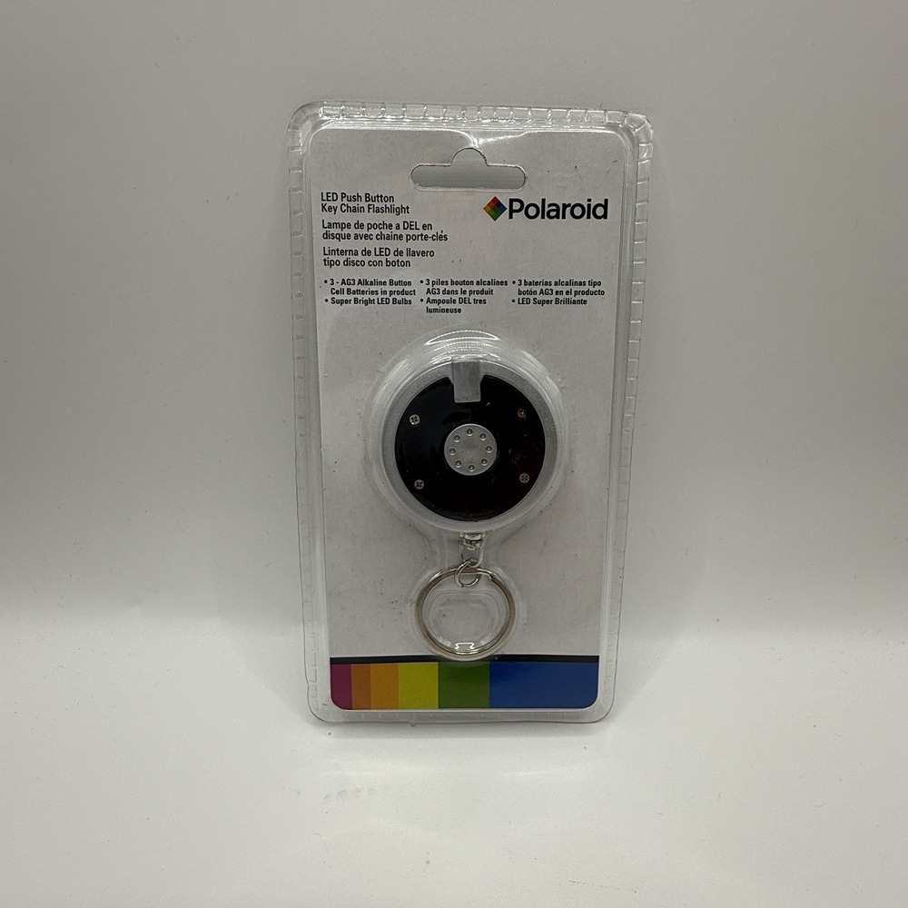POLAROID LED PUSH BUTTON DISC‎ KEY CHAIN FLASHLIGHT (31004)
